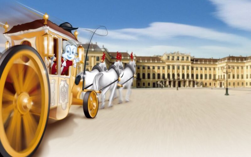 Eine Zeichentrickfigur fährt in einer gelben Kutsche, die von weißen Pferden gezogen wird, vor einem großen Palastgebäude.